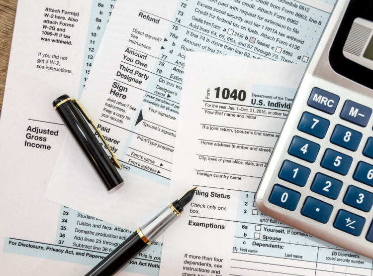tax documents and calculator